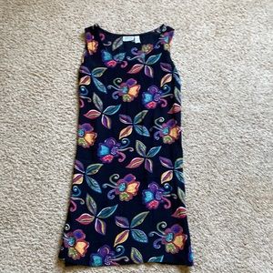 Vibrant sun dress. Very comfortable. Length from shoulder to hem is 39 1/2 inch